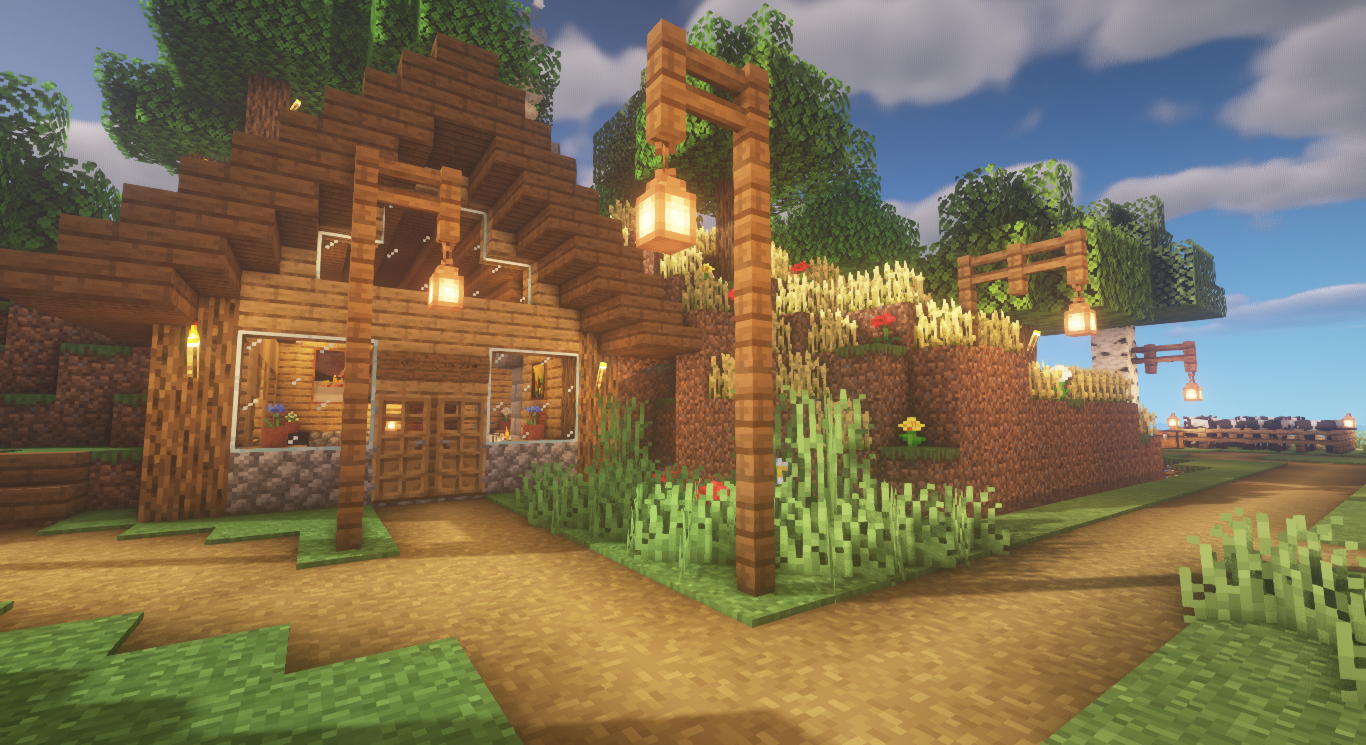 Image of forking road in front of a cozy house in Minecraft